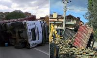 FRENİ PATLAYAN ODUN YÜKLÜ KAMYON DEVRİLDİ